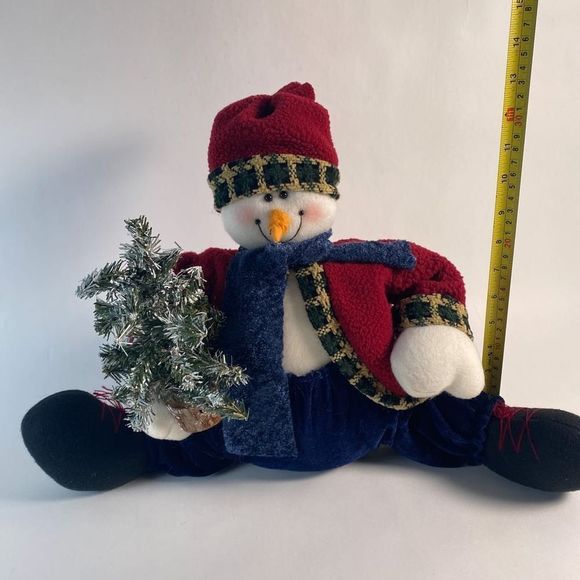 Plush Snowman holding artificial snow flocked tree. - Picture 7 of 9